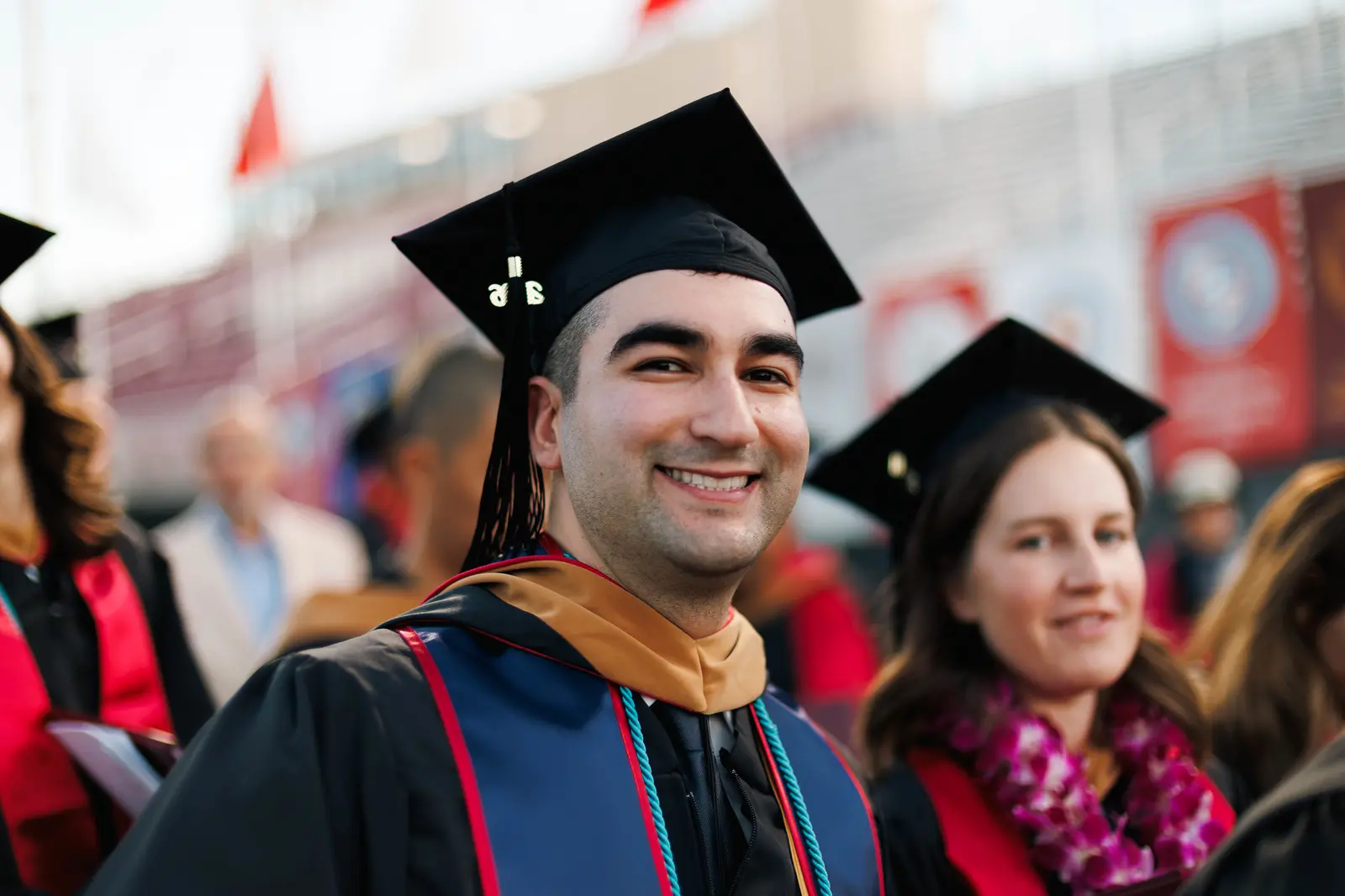 Jonathan Guzman celebrating his Santa Clara University graduation